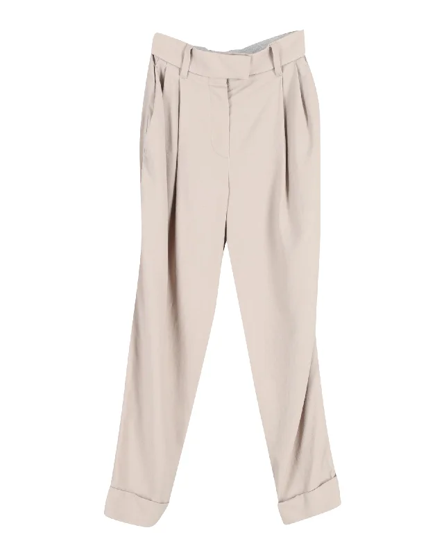 Leather women trousers for a bold and edgy lookBrunello Cucinelli Pleated Trousers in Beige Lana Vergine