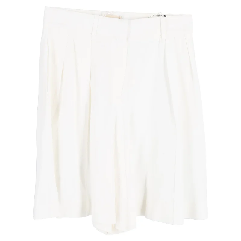 Embroidered Women Shorts with Intricate DesignsKhaite Isabelle Pleated High-Rise Shorts in White Acetate