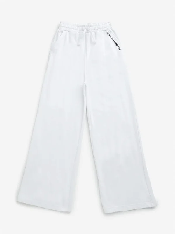 Linen Women Shorts for Breathable Comfort in Hot WeatherY&F Kids White Text Design Print Mid Rise Track Pants